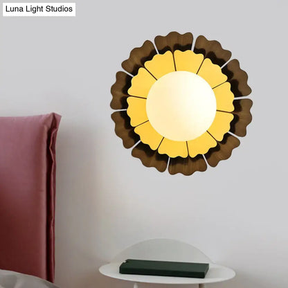 Glass Sunflower Wall Sconce with yellow petals, brown outer ring, frosted center by Decorbites on Tampa Home & Garden Store