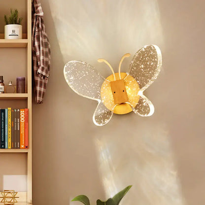 Crystal Butterfly Wall Sconce by Decorbites with yellow body and speckled wings on Tampa Home & Garden Store