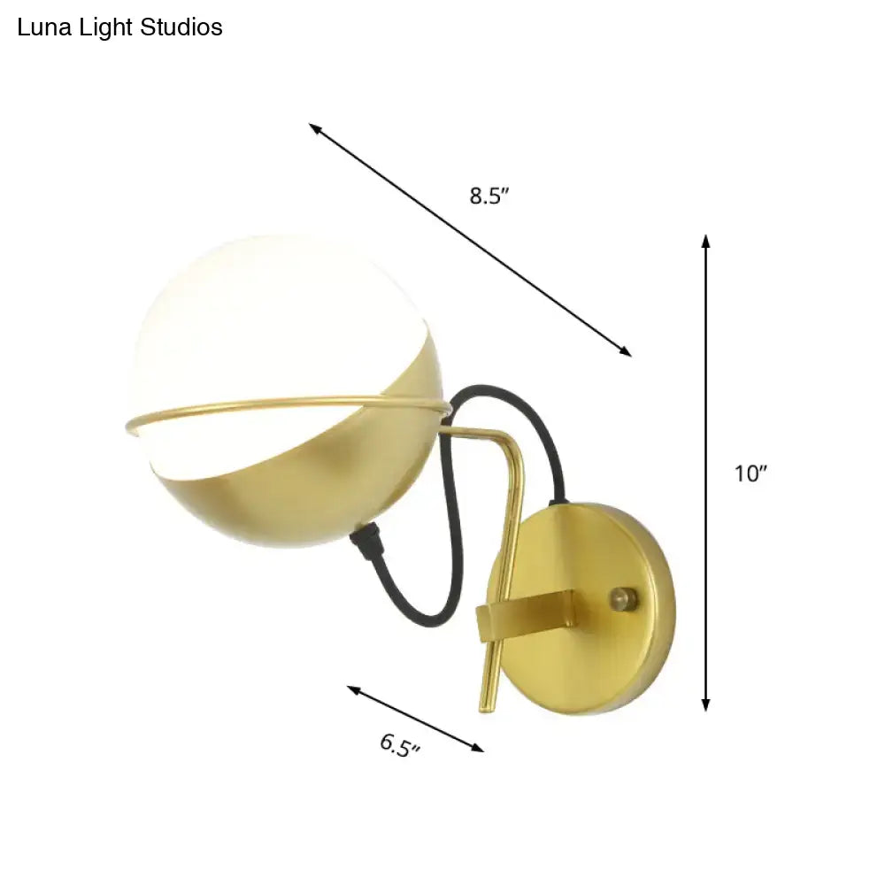 Yellow globe wall sconce with matte glass shade and brass finish, Decorbites industrial style on Tampa Home & Garden Store