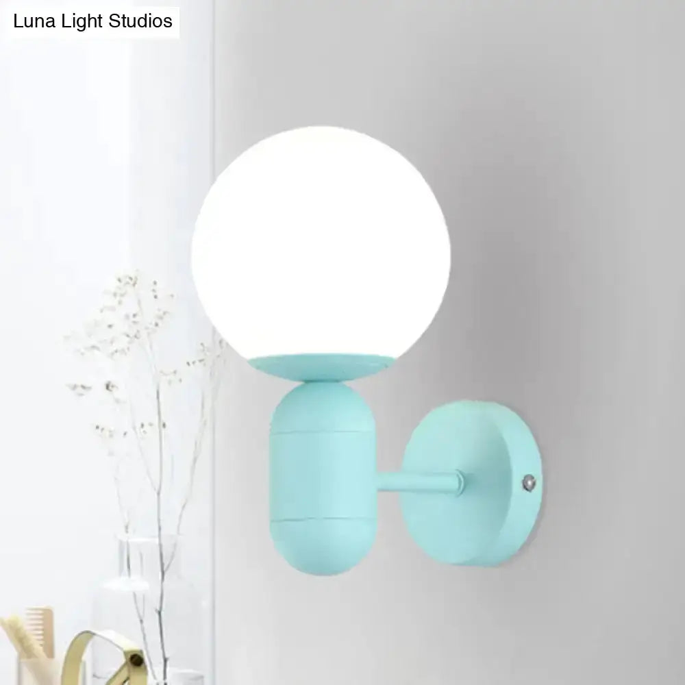 Modern Yellow Wall Lamp with Frosted Orb Shade