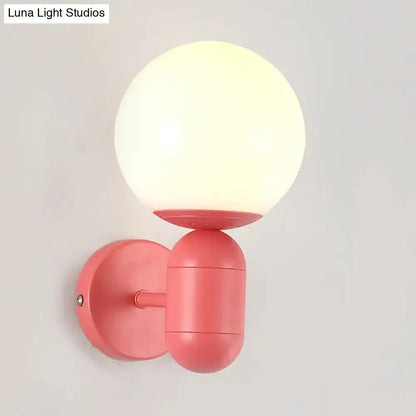 Modern Yellow Wall Lamp with Frosted Orb Shade
