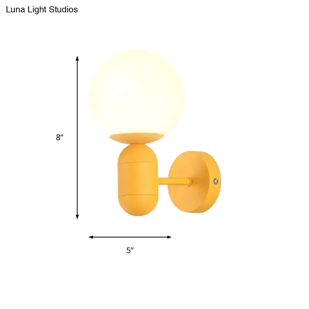 Modern Yellow Wall Lamp with Frosted Orb Shade
