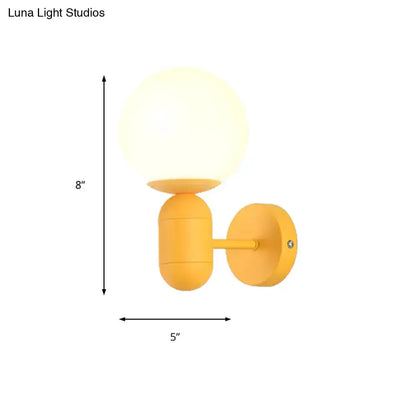 Modern Yellow Wall Lamp with Frosted Orb Shade