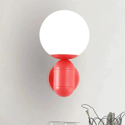 Modern Yellow Wall Lamp with Frosted Orb Shade
