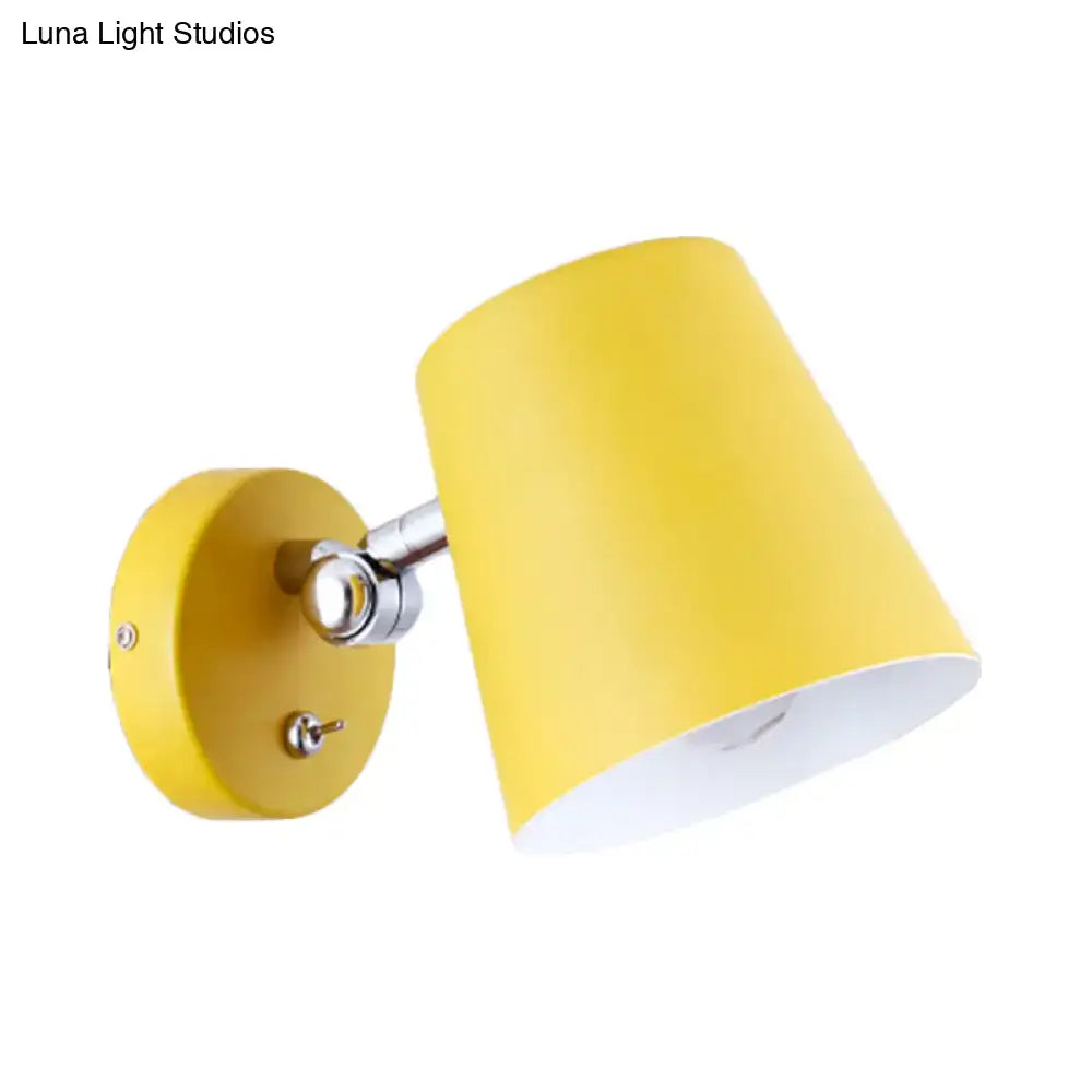 Decorbites yellow metal sconce light with chrome arm and yellow shade on wall on Tampa Home & Garden Store