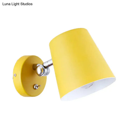 Decorbites yellow metal sconce light with chrome arm and yellow shade on wall on Tampa Home & Garden Store