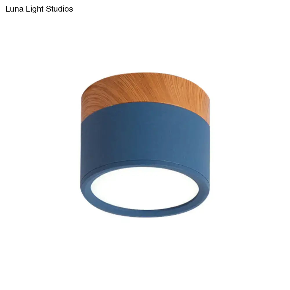 Blue cylindrical flush mount ceiling light with wood grain top by Decorbites on Tampa Home & Garden Store