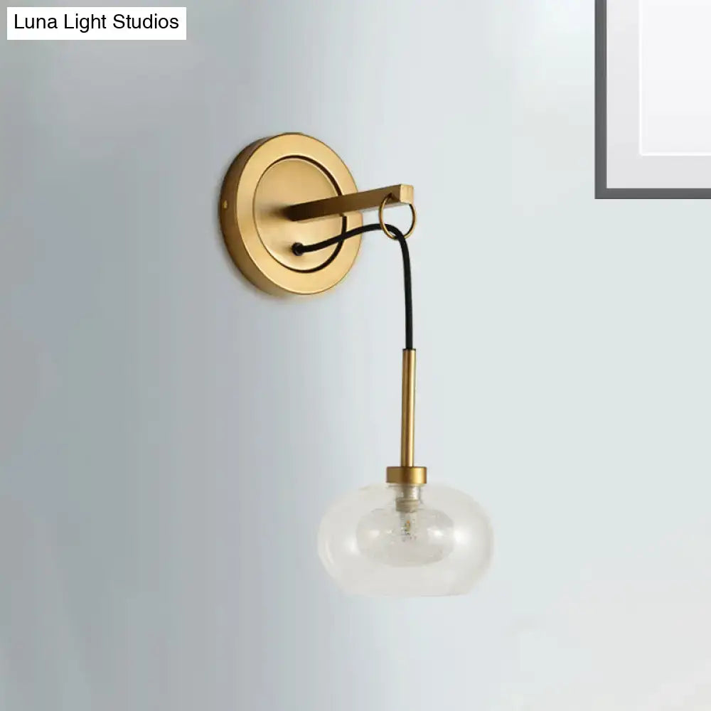 Amber White Glass Sconce by Decorbites, gold-tone wall mount with clear glass globe on Tampa Home & Garden Store