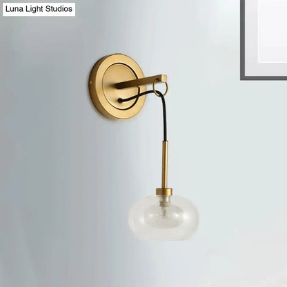 Amber White Glass Sconce by Decorbites, gold-tone wall mount with clear glass globe on Tampa Home & Garden Store