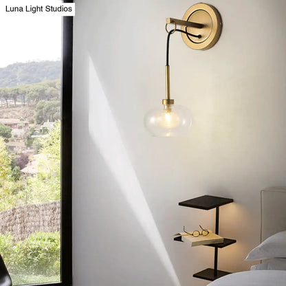 Amber White Glass Sconce by Decorbites; brass wall mount with clear glass globe on Tampa Home & Garden Store