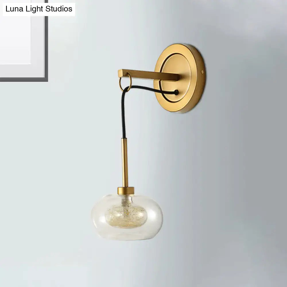 Amber White Glass Sconce by Decorbites with brass mount and clear glass shade on Tampa Home & Garden Store