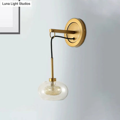 Amber White Glass Sconce by Decorbites with brass mount and clear glass shade on Tampa Home & Garden Store