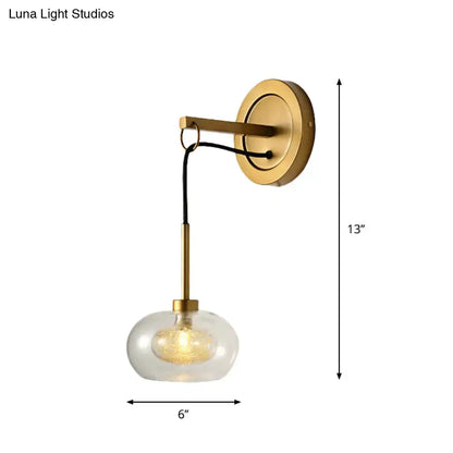 Amber White Glass Sconce by Decorbites, brass wall light with clear glass globe, 13in tall on Tampa Home & Garden Store