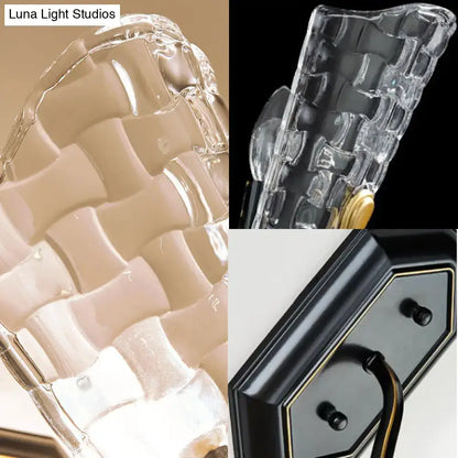 Black crystal panel wall sconce with curved arm and clear crystal panels on Tampa Home & Garden Store