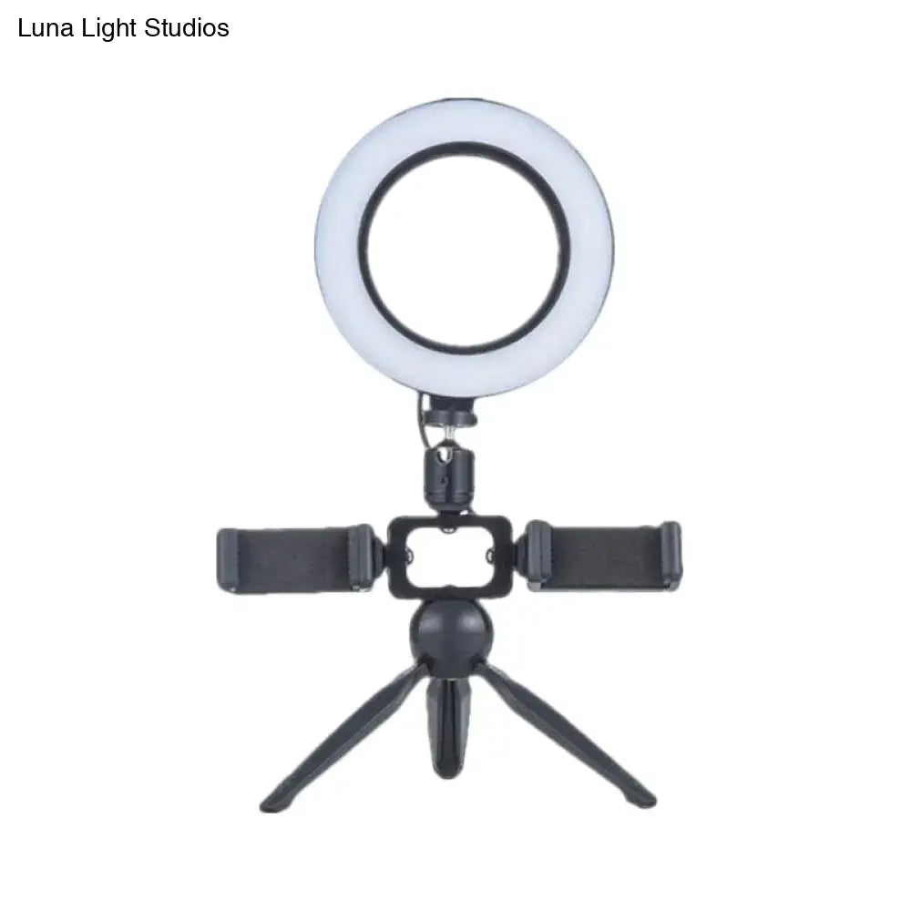 Black LED ring light with phone mount on mini tripod on Tampa Home & Garden Store