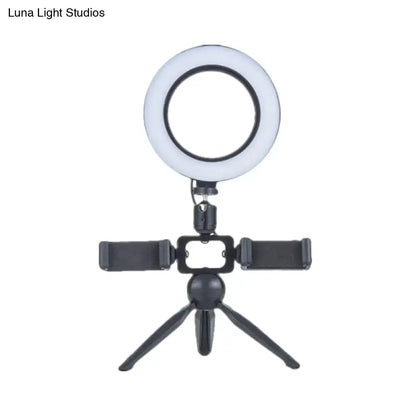 Black LED ring light with phone mount on mini tripod on Tampa Home & Garden Store