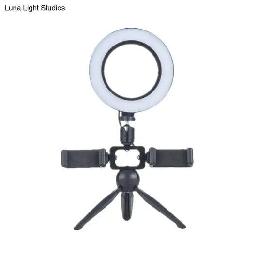 Black LED ring light with phone mount on mini tripod on Tampa Home & Garden Store