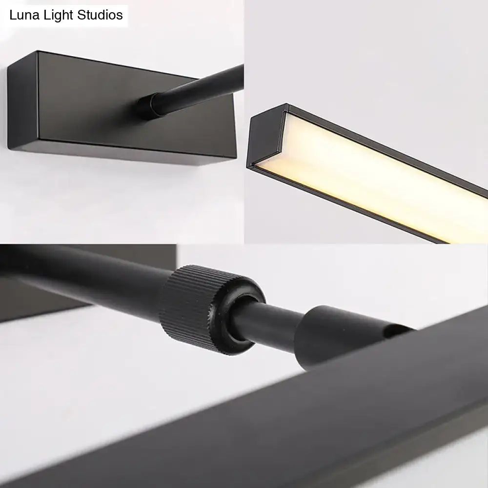 Modernist black and silver metal linear vanity sconce with wall-mount base and frosted LED bar on Tampa Home & Garden Store