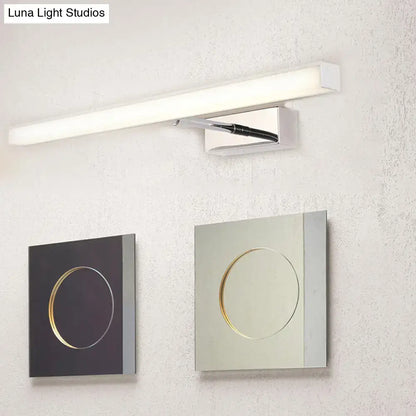 Modernist black and silver metal linear vanity sconce with LED light on wall on Tampa Home & Garden Store