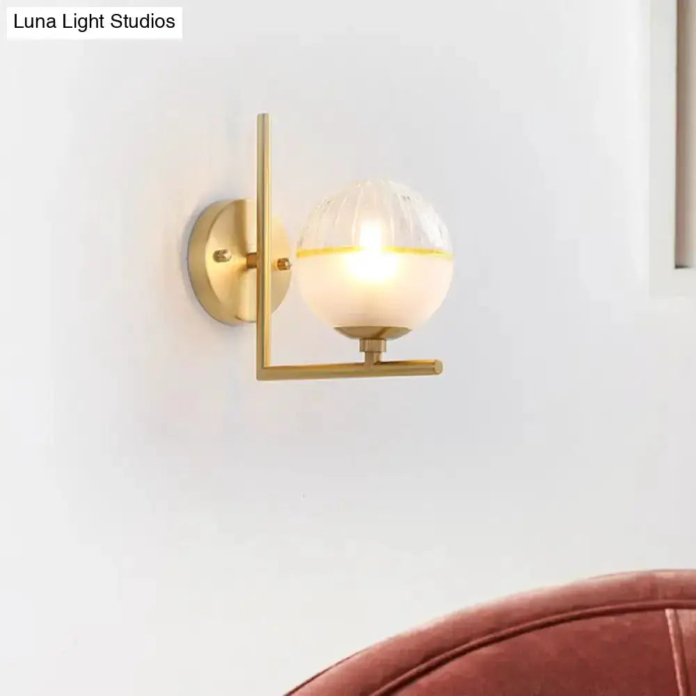 Modernist brass wall sconce with frosted glass globe, bedroom lighting by Decorbites on Tampa Home & Garden Store