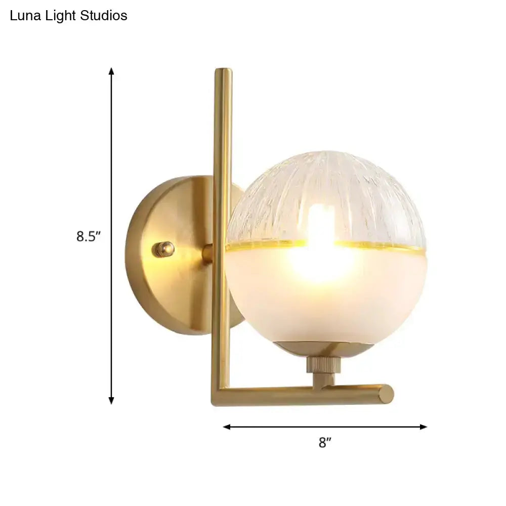 Decorbites modernist brass wall sconce with frosted glass globe for bedroom on Tampa Home & Garden Store