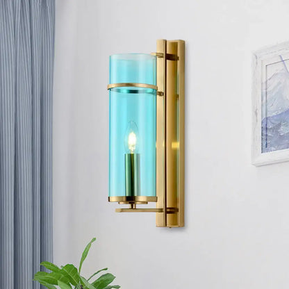 Brass Water Blue Glass Sconce by Decorbites; light with glass cylinder shade and candle bulb on Tampa Home & Garden Store