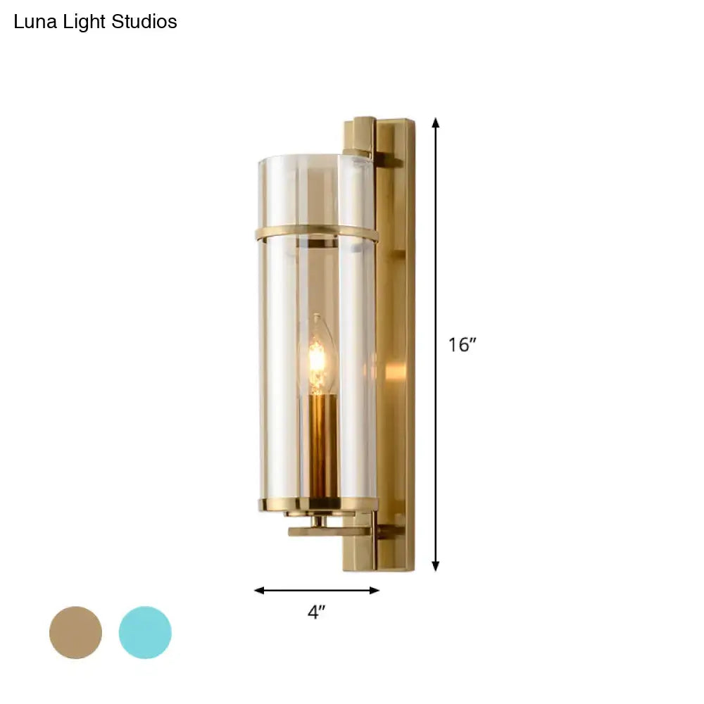 Brass water blue glass sconce with cylindrical shade and backplate by Decorbites on Tampa Home & Garden Store