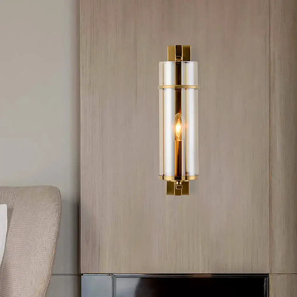 Brass Water Blue Glass Sconce by Decorbites, wall-mounted cylindrical glass lamp with warm glow on Tampa Home & Garden Store