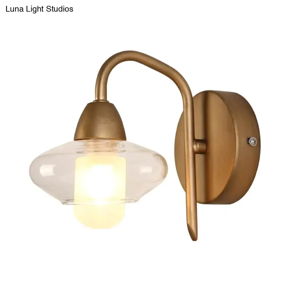 Brass clear wall lamp by Decorbites with curved arm and glass shade wall sconce on Tampa Home & Garden Store