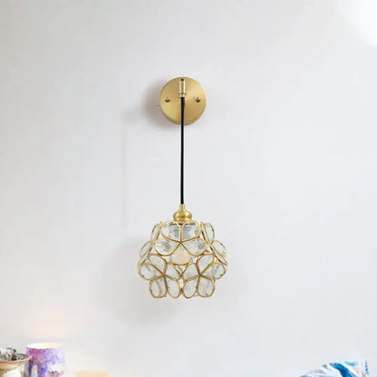 Brass floral glass sconce with gold-tone metal frame and glass petals by Decorbites on Tampa Home & Garden Store