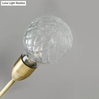 Modernist brass wall mount light fixture with prismatic glass bulb bedroom Decorbites on Tampa Home & Garden Store