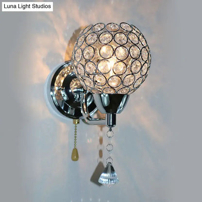Chrome crystal metal frame wall light sconce with a glass orb and hanging prisms by Decorbites on Tampa Home & Garden Store