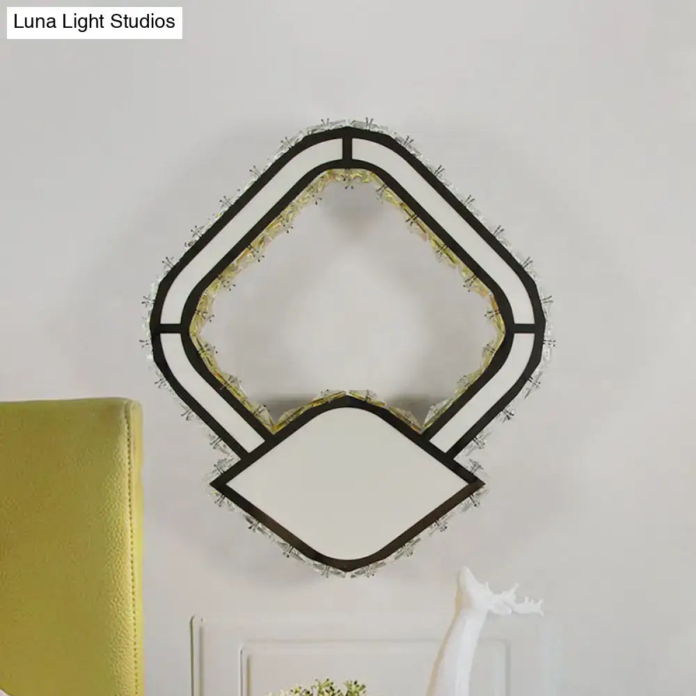 Crystal LED Wall Sconce by Decorbites with geometric black frame and crystal fringe on Tampa Home & Garden Store