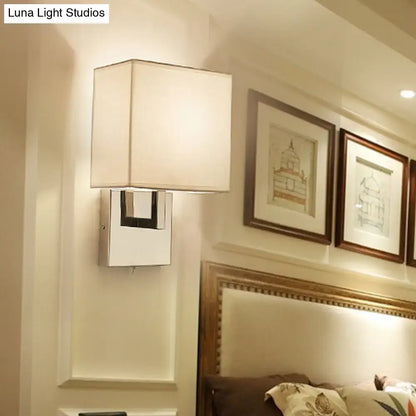 Beige gold wall sconce by Decorbites with square shade and chrome backplate on bedroom wall on Tampa Home & Garden Store