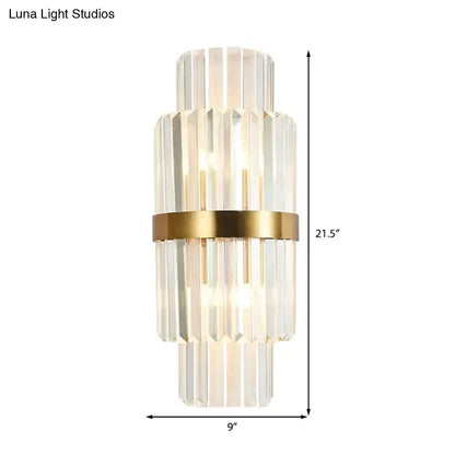 Wall sconce by Decorbites: modernist gold and clear crystal cylinder with a gold band on Tampa Home & Garden Store