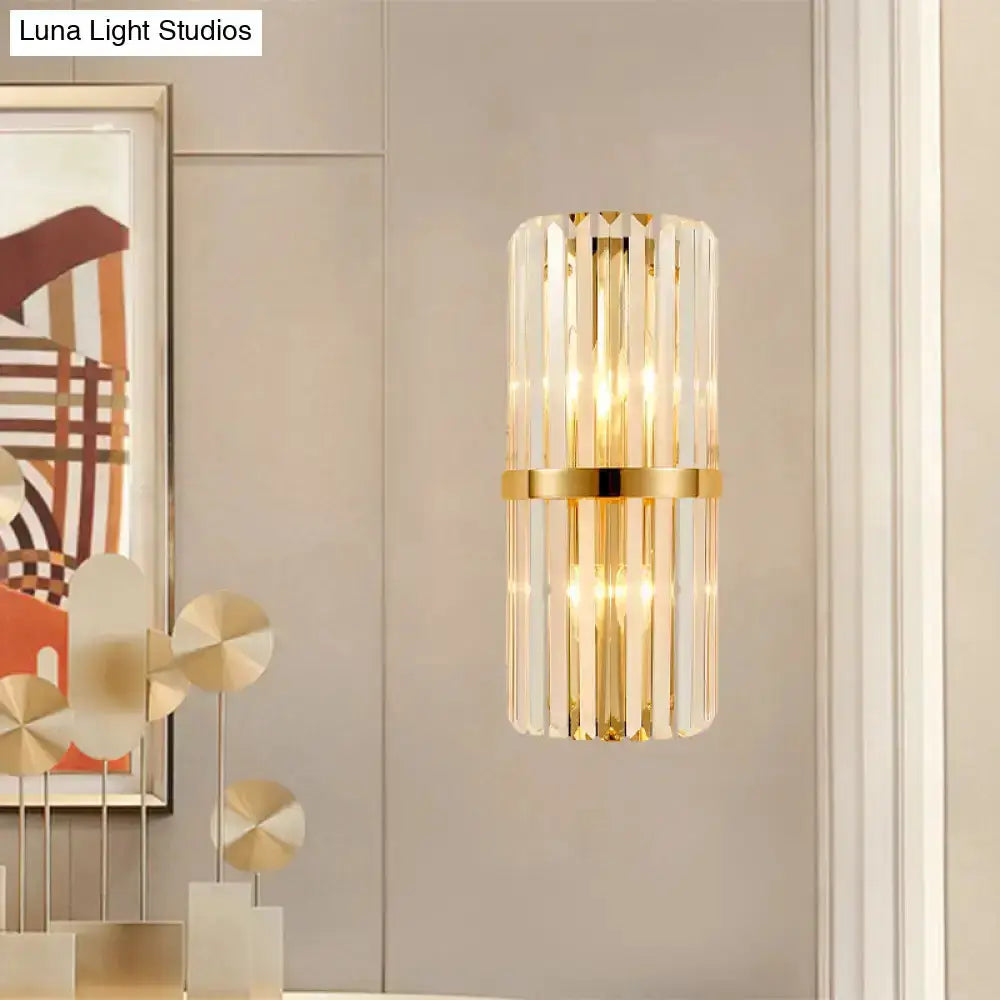 Modernist gold and clear crystal cylinder wall light by Decorbites with living room glow on Tampa Home & Garden Store
