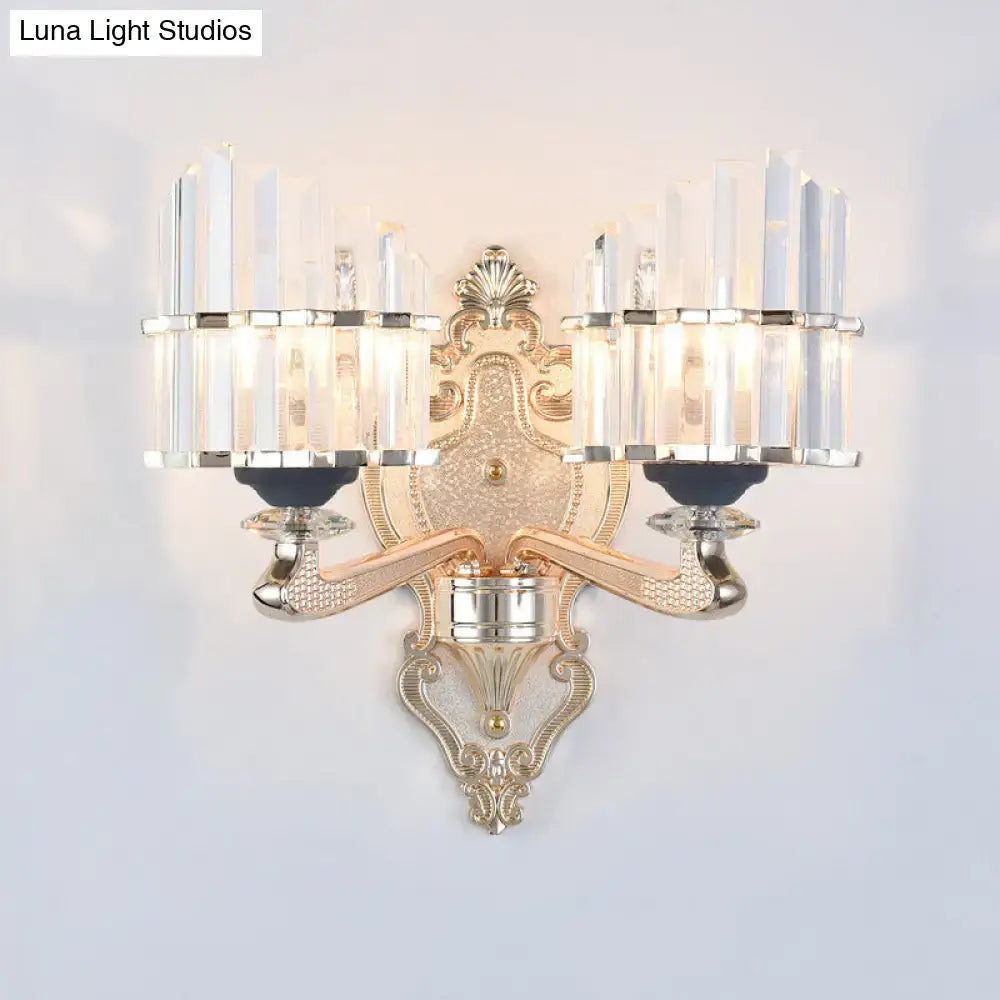 Gold crystal conical rod wall sconce with ornate backplate and dual prisms by Decorbites on Tampa Home & Garden Store