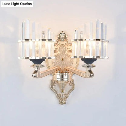 Gold crystal conical rod wall sconce with ornate backplate and dual prisms by Decorbites on Tampa Home & Garden Store