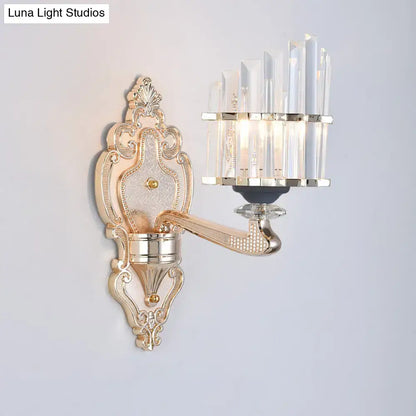 Decorbites Gold Crystal Conical Rod Wall Sconce with ornate backplate and crystal prisms on Tampa Home & Garden Store