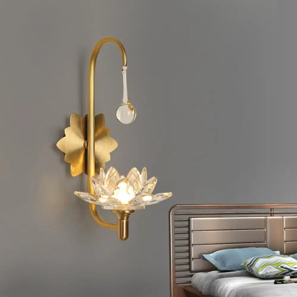 Gold crystal lotus sconce with curved gold arm and crystal lotus shade by Decorbites on Tampa Home & Garden Store