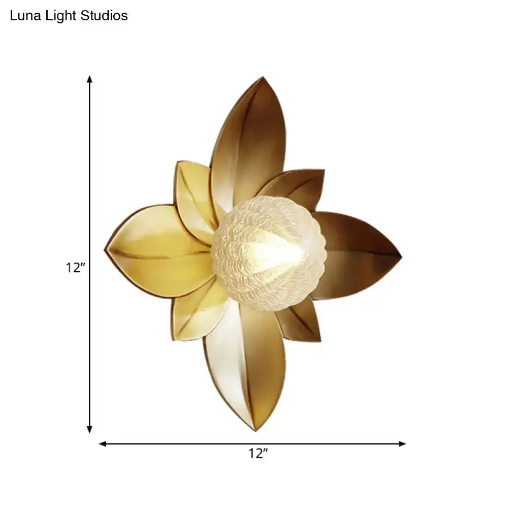 Modernist gold flower wall sconce with frosted glass center 12in wide on Tampa Home & Garden Store