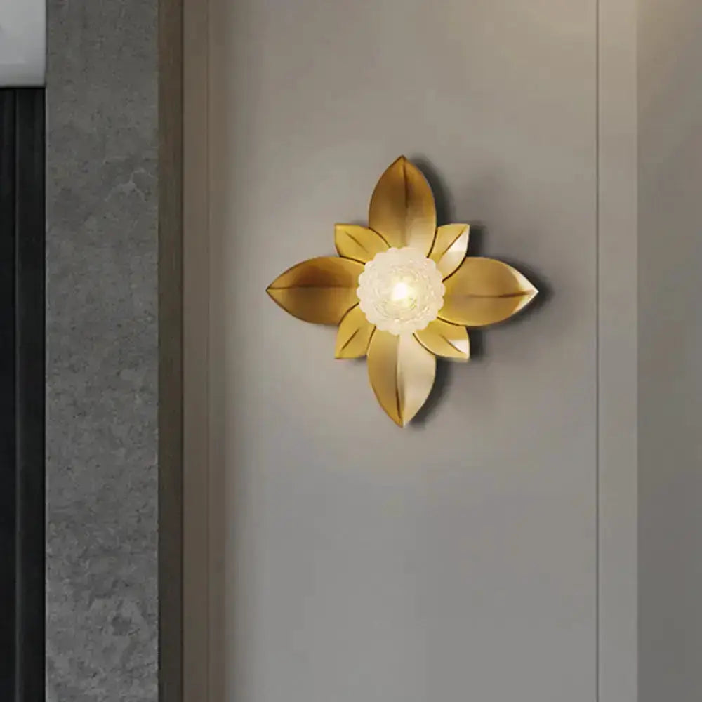 Modernist gold flower wall sconce with frosted glass center on Tampa Home & Garden Store