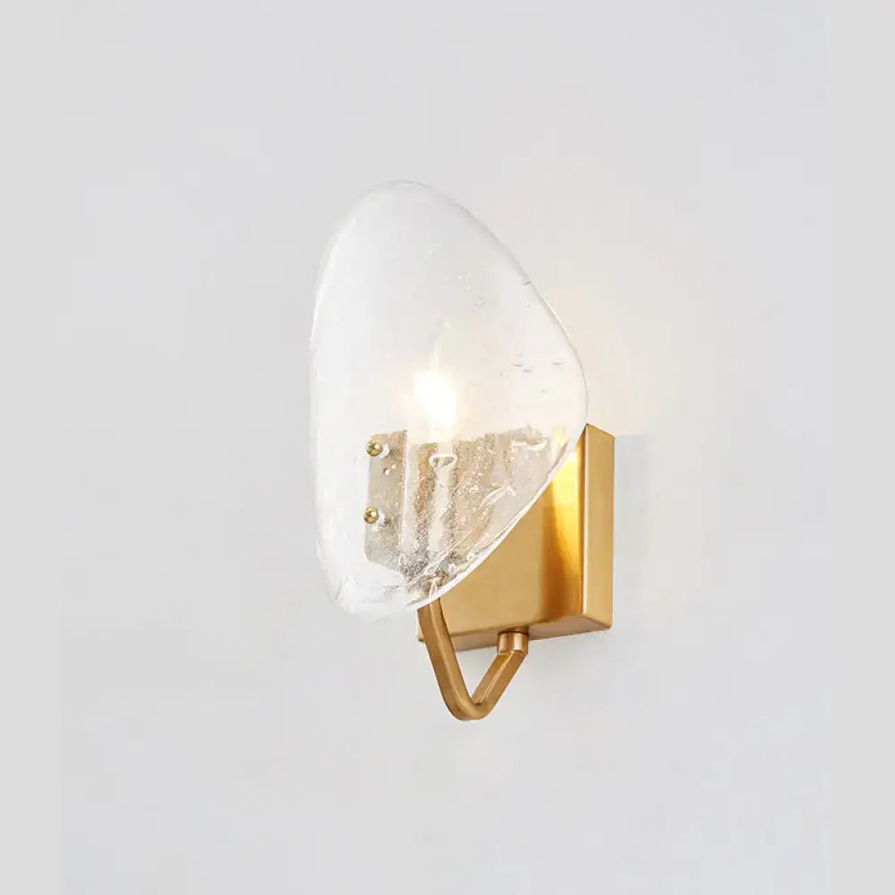 Gold glass shield wall sconce with industrial brass finish by Decorbites on Tampa Home & Garden Store