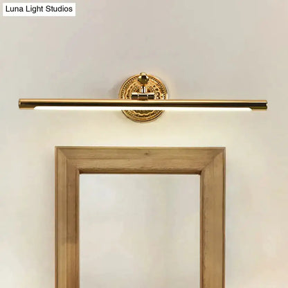 Modernist gold linear vanity wall light fixture with ornate round backplate by Decorbites on Tampa Home & Garden Store