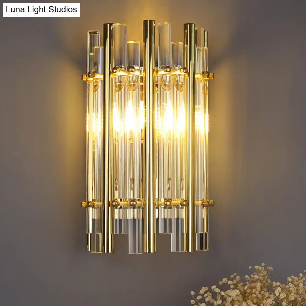 Gold tubular crystal wall sconce with vertical glass tubes, warm glow by Decorbites on Tampa Home & Garden Store