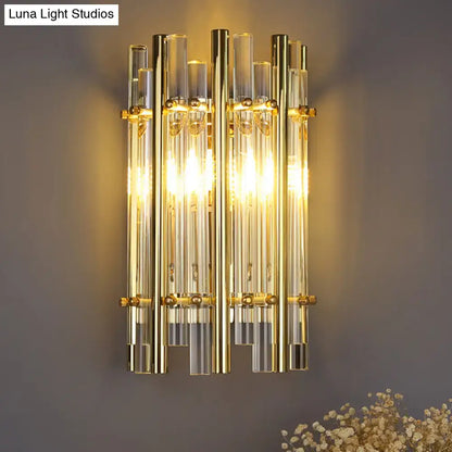 Gold tubular crystal wall sconce with vertical glass tubes, warm glow by Decorbites on Tampa Home & Garden Store