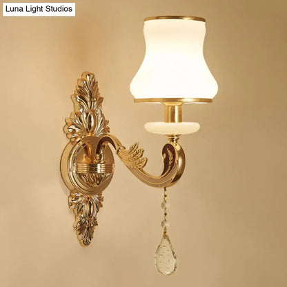 Gold Glass Shade Sconce with ornate leaf backplate and crystal drop on Tampa Home & Garden Store