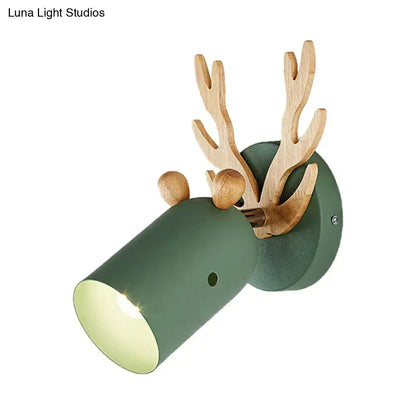 Green Wood Antler Sconce by Decorbites with green metal body and natural wooden antlers on Tampa Home & Garden Store