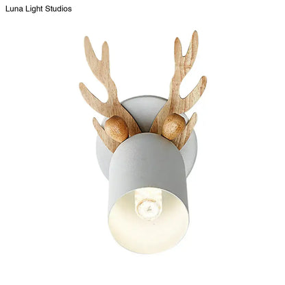 Green Wood Antler Sconce by Decorbites; grey metal housing with natural wood antlers on Tampa Home & Garden Store