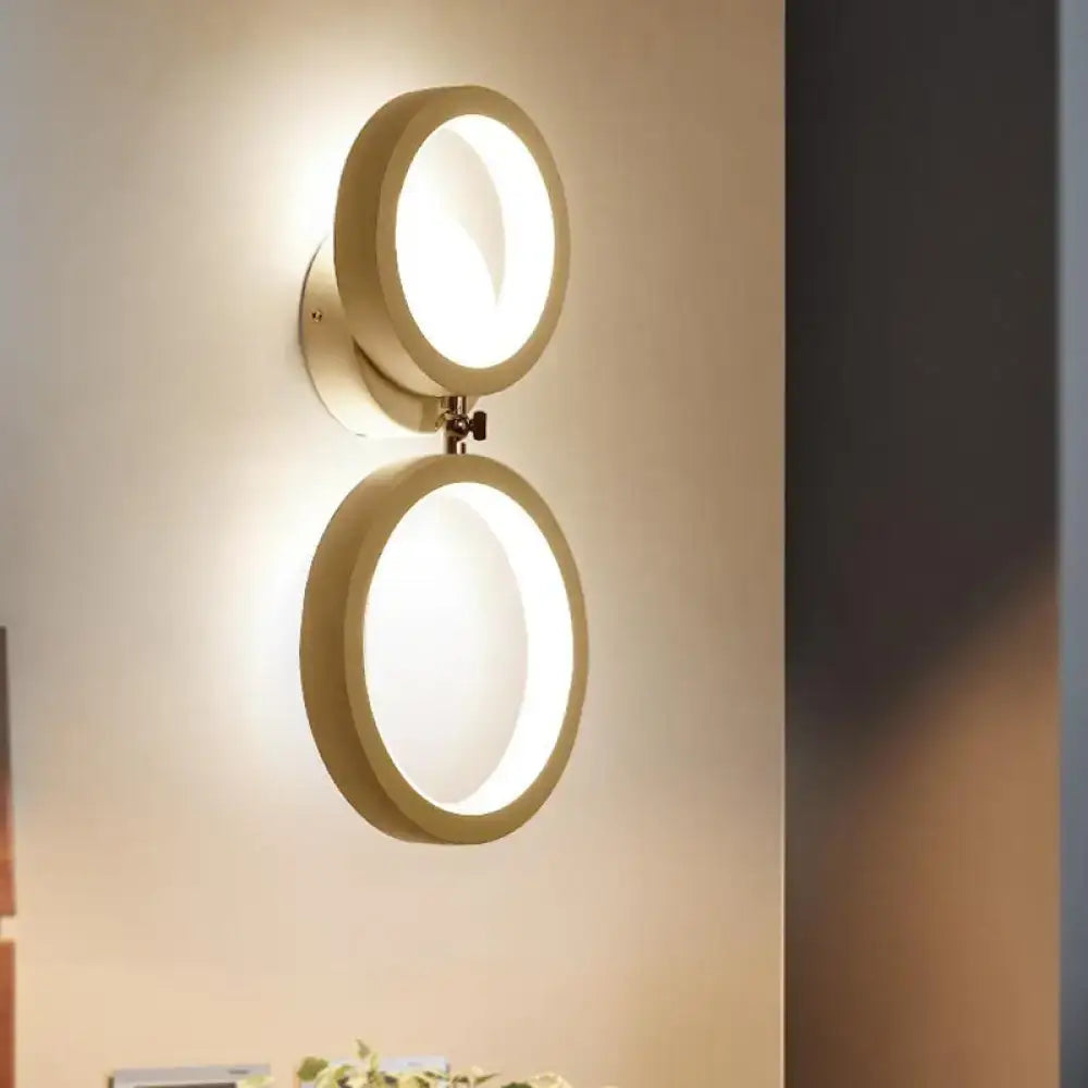Beige double ring wall lamp by Decorbites with twin circular glowing rings on Tampa Home & Garden Store